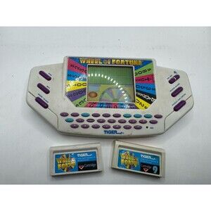 Tiger Electronics Wheel of Fortune Handheld Electronic game for parts or repair